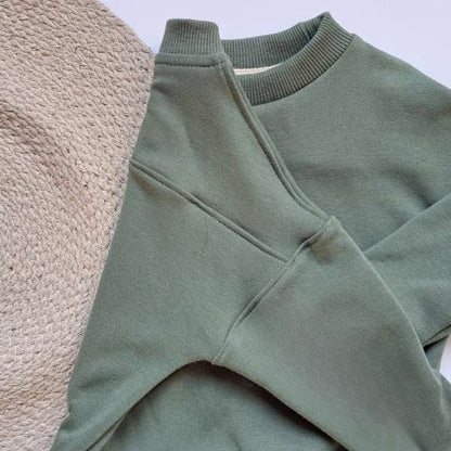 Chandail à manches longues avec couture dans le dos qui donne un look très urbain