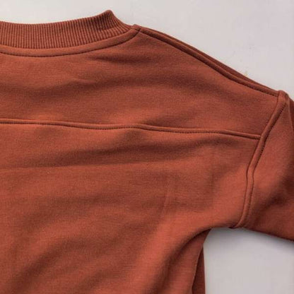 Couture dans le dos qui crée un bel effet