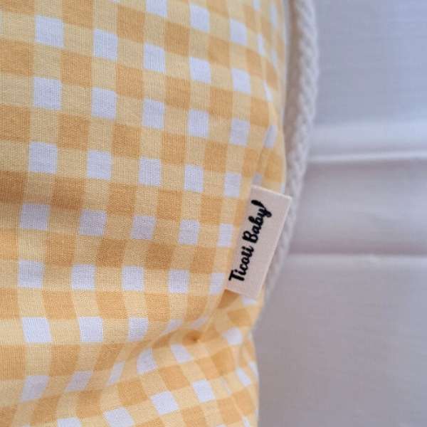 Sac à cordons avec des petits carreaux jaune pour la garderie, les jouets, les vêtements