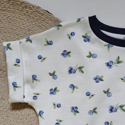 Barboteuse pour bébé avec un tissu de bleuets