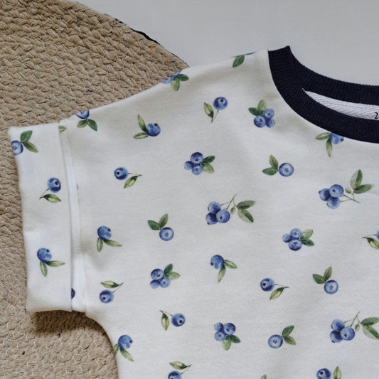 Barboteuse pour bébé avec un tissu de bleuets